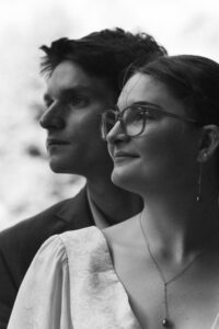 A newlywed couple that had just eloped admiring Letchworth State Park in a black and white silhouette