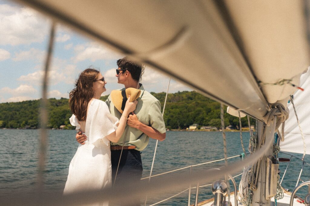 bride and groom on a sailboat