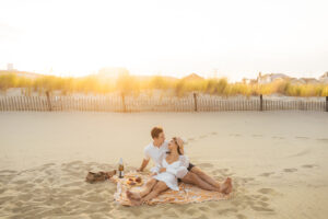 a couple has a picnic on the jersey shore