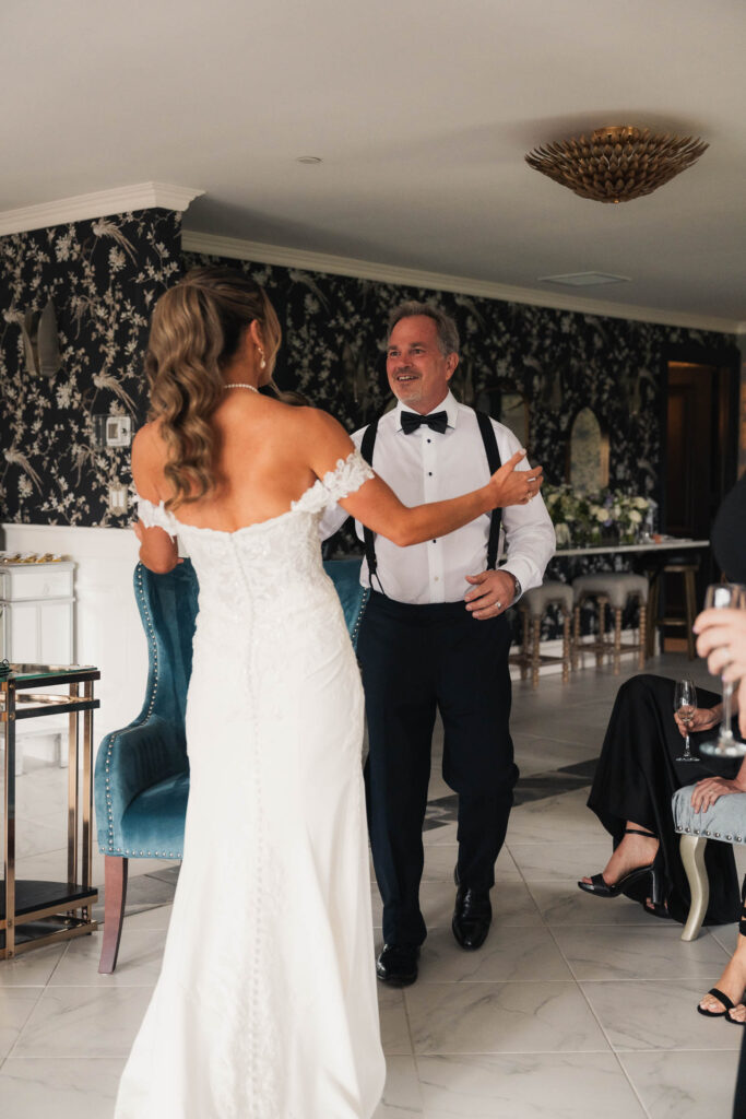 father seeing his daughter on her wedding day