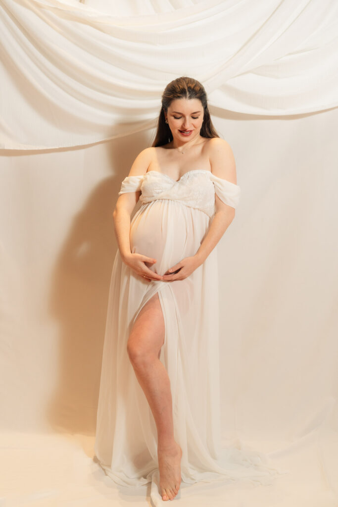 maternity photos of two ballroom dancers