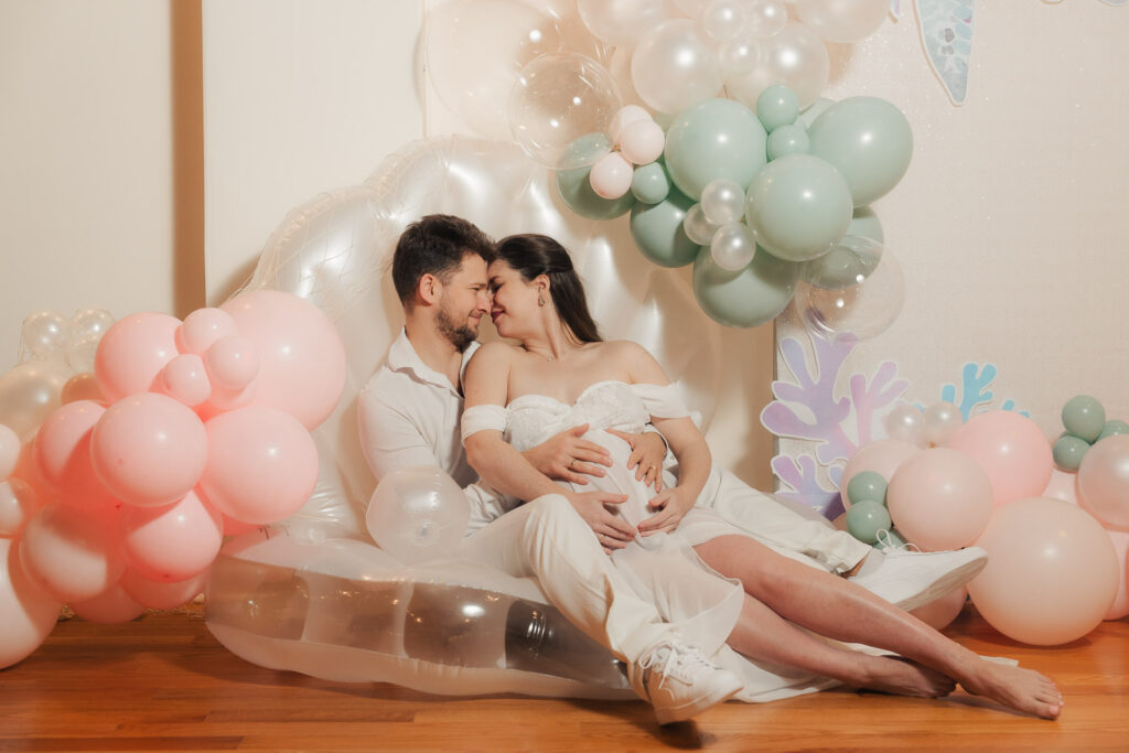 maternity photos of two ballroom dancers