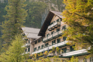 A summer elopement at the reflective lake of Lago Di Braies in the Italian Dolomites.