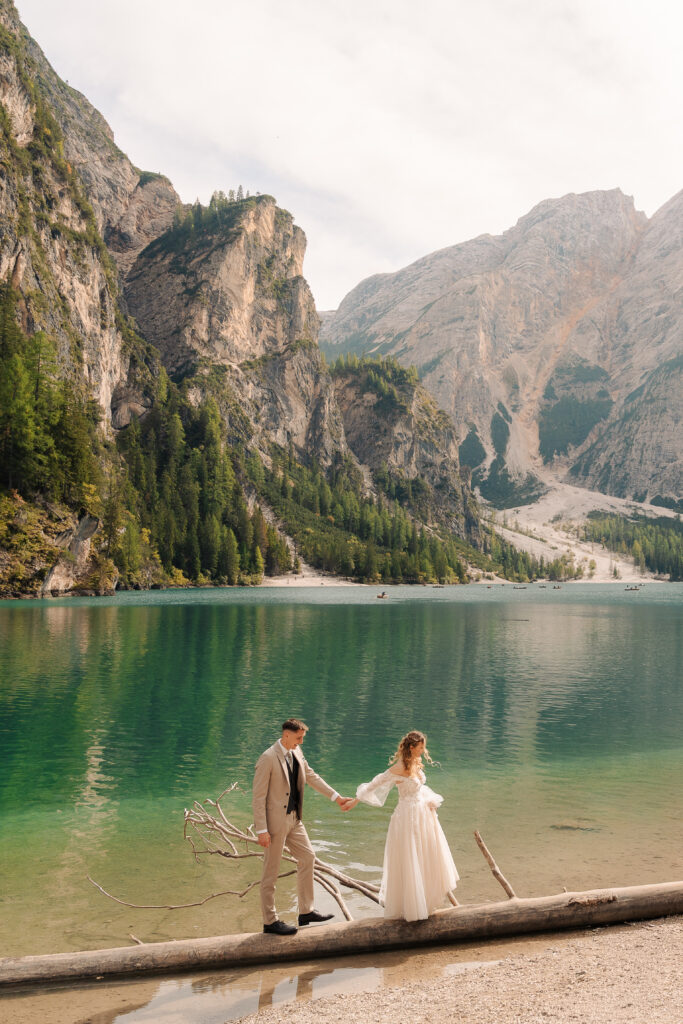 A summer elopement at the reflective lake of Lago Di Braies in the Italian Dolomites.