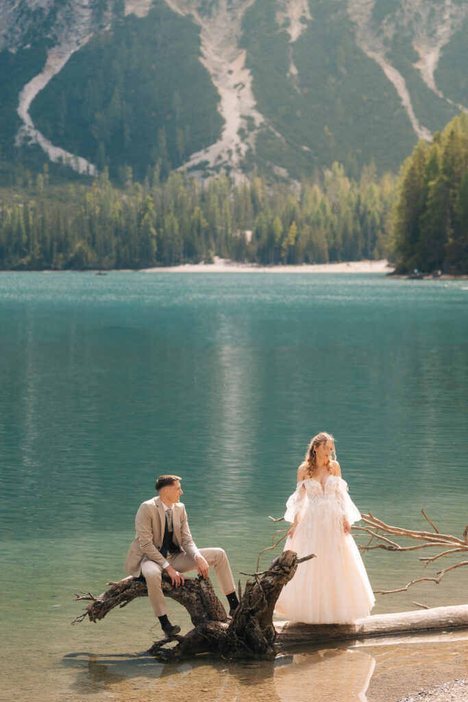 A summer elopement at the reflective lake of Lago Di Braies in the Italian Dolomites.