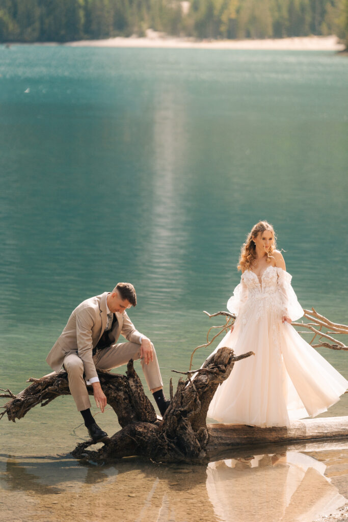 A summer elopement at the reflective lake of Lago Di Braies in the Italian Dolomites.
