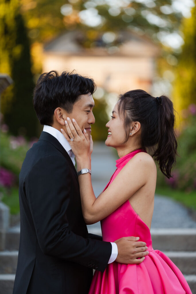 A romantic autumn proposal at Old Westbury Gardens in Old Westbury, New York, featuring a surprise family reveal, golden hour portraits, and a joyful engagement celebration