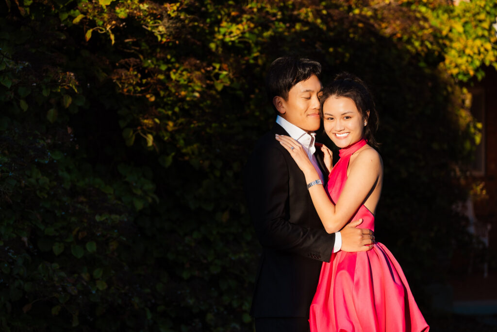 A romantic autumn proposal at Old Westbury Gardens in Old Westbury, New York, featuring a surprise family reveal, golden hour portraits, and a joyful engagement celebration