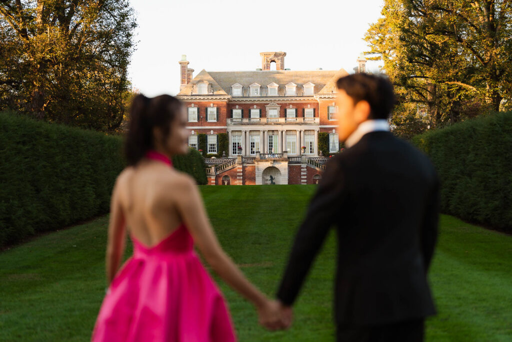 A romantic autumn proposal at Old Westbury Gardens in Old Westbury, New York, featuring a surprise family reveal, golden hour portraits, and a joyful engagement celebration