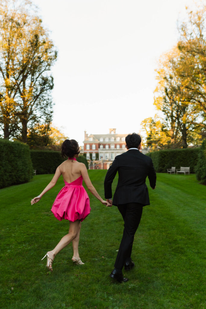 A romantic autumn proposal at Old Westbury Gardens in Old Westbury, New York, featuring a surprise family reveal, golden hour portraits, and a joyful engagement celebration