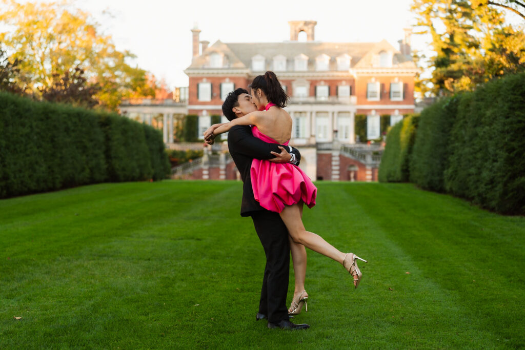A romantic autumn proposal at Old Westbury Gardens in Old Westbury, New York, featuring a surprise family reveal, golden hour portraits, and a joyful engagement celebration