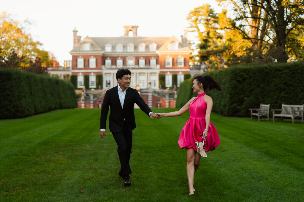 A romantic autumn proposal at Old Westbury Gardens in Old Westbury, New York, featuring a surprise family reveal, golden hour portraits, and a joyful engagement celebration