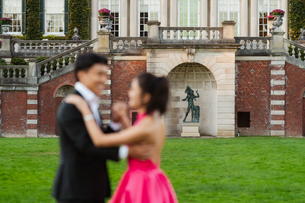 A romantic autumn proposal at Old Westbury Gardens in Old Westbury, New York, featuring a surprise family reveal, golden hour portraits, and a joyful engagement celebration