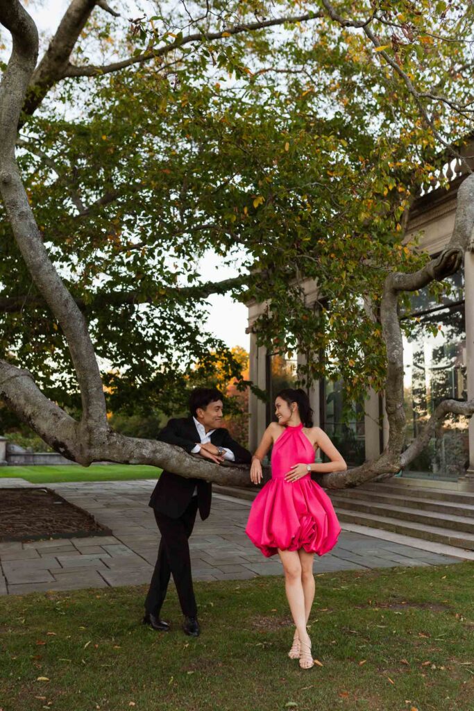 A romantic autumn proposal at Old Westbury Gardens in Old Westbury, New York, featuring a surprise family reveal, golden hour portraits, and a joyful engagement celebration