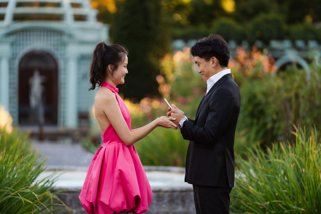 A romantic autumn proposal at Old Westbury Gardens in Old Westbury, New York, featuring a surprise family reveal, golden hour portraits, and a joyful engagement celebration