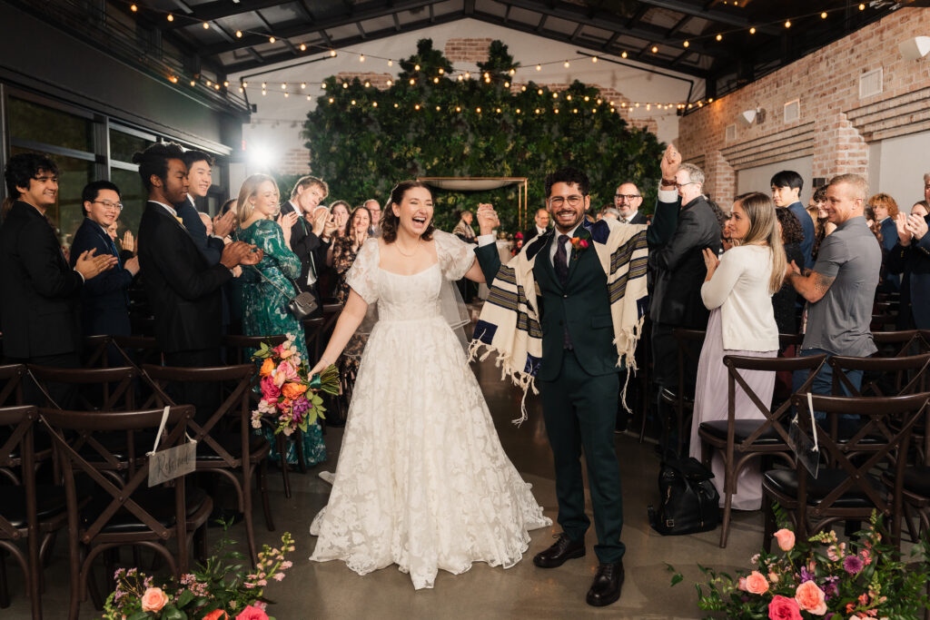 A romantic winter wedding at Perona Farms in Andover, New Jersey. Snowy portraits, a greenhouse ceremony in The Refinery, colorful florals, and nonstop celebration.