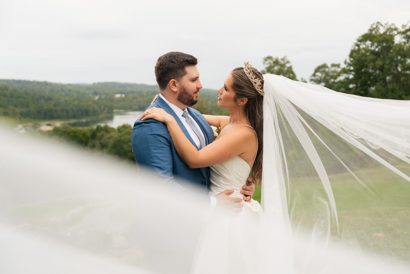 A bride and groom looking at each other at Skyview Golf Club.