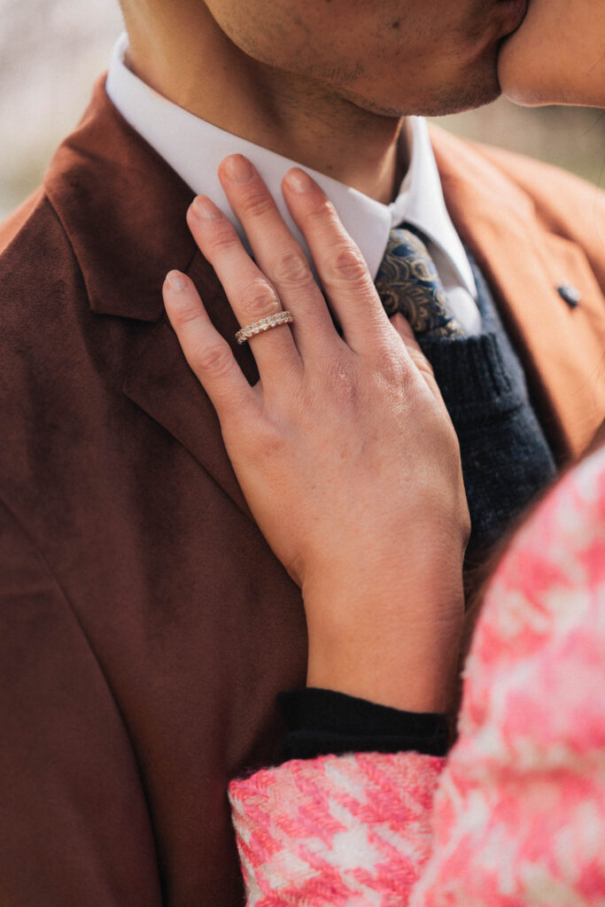 A proposal during cherry blossom season at Brooklyn Botanic Gardens.