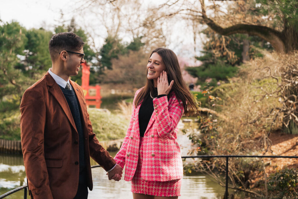 A proposal during cherry blossom season at Brooklyn Botanic Gardens.
