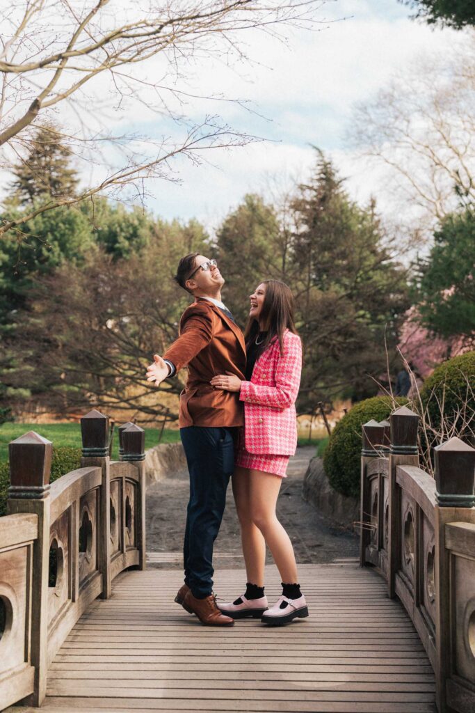 A proposal during cherry blossom season at Brooklyn Botanic Gardens.