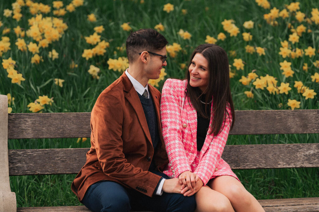 A proposal during cherry blossom season at Brooklyn Botanic Gardens.
