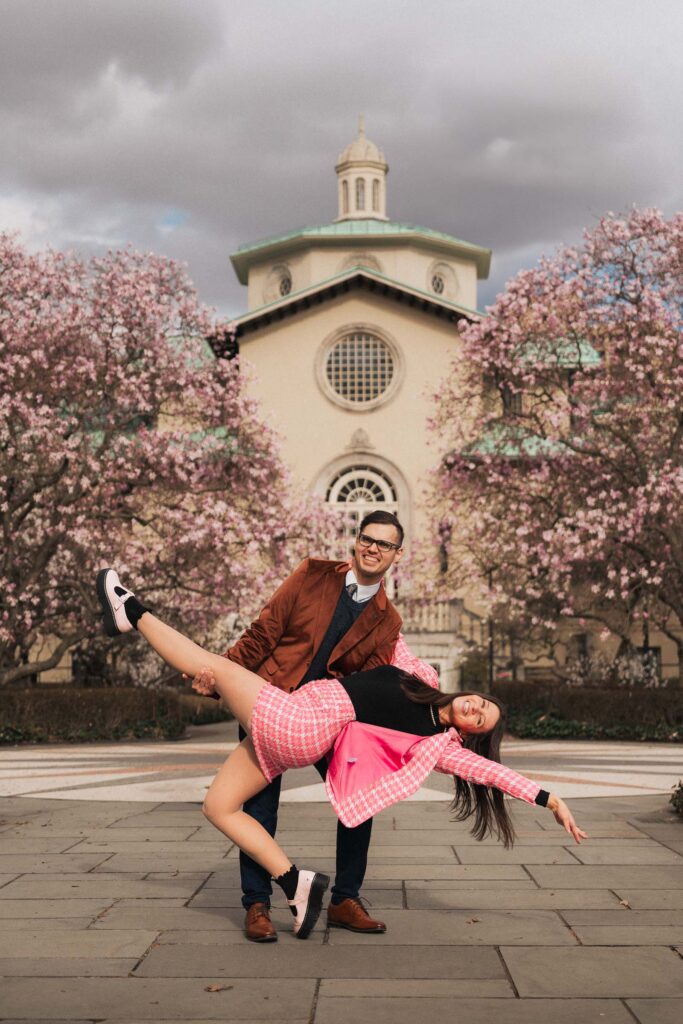 A proposal during cherry blossom season at Brooklyn Botanic Gardens.