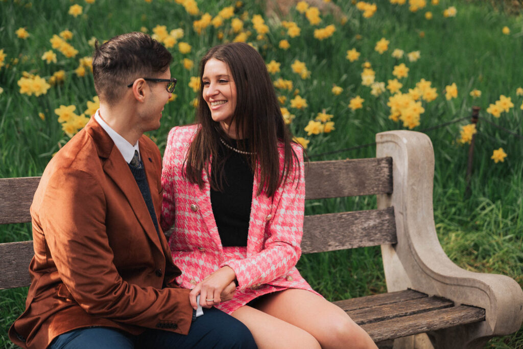 A proposal during cherry blossom season at Brooklyn Botanic Gardens.