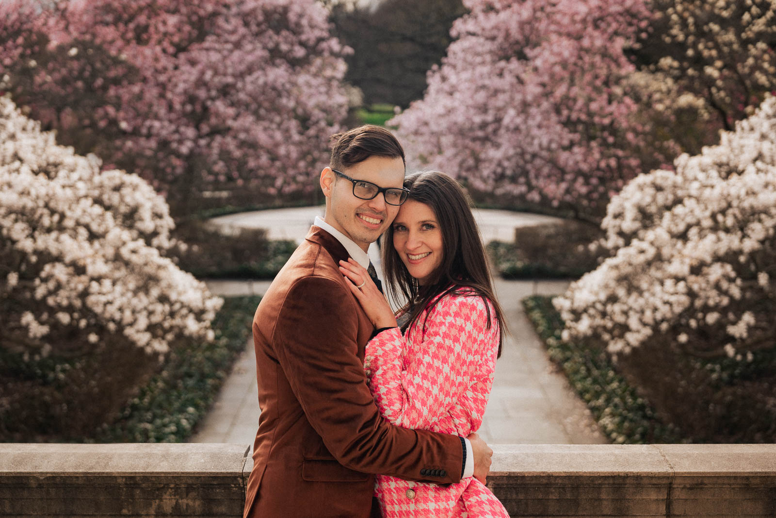 A proposal during cherry blossom season at Brooklyn Botanic Gardens.
