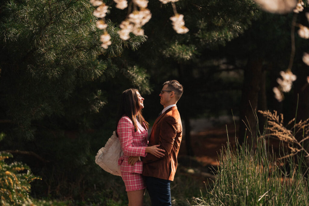 A proposal during cherry blossom season at Brooklyn Botanic Gardens.