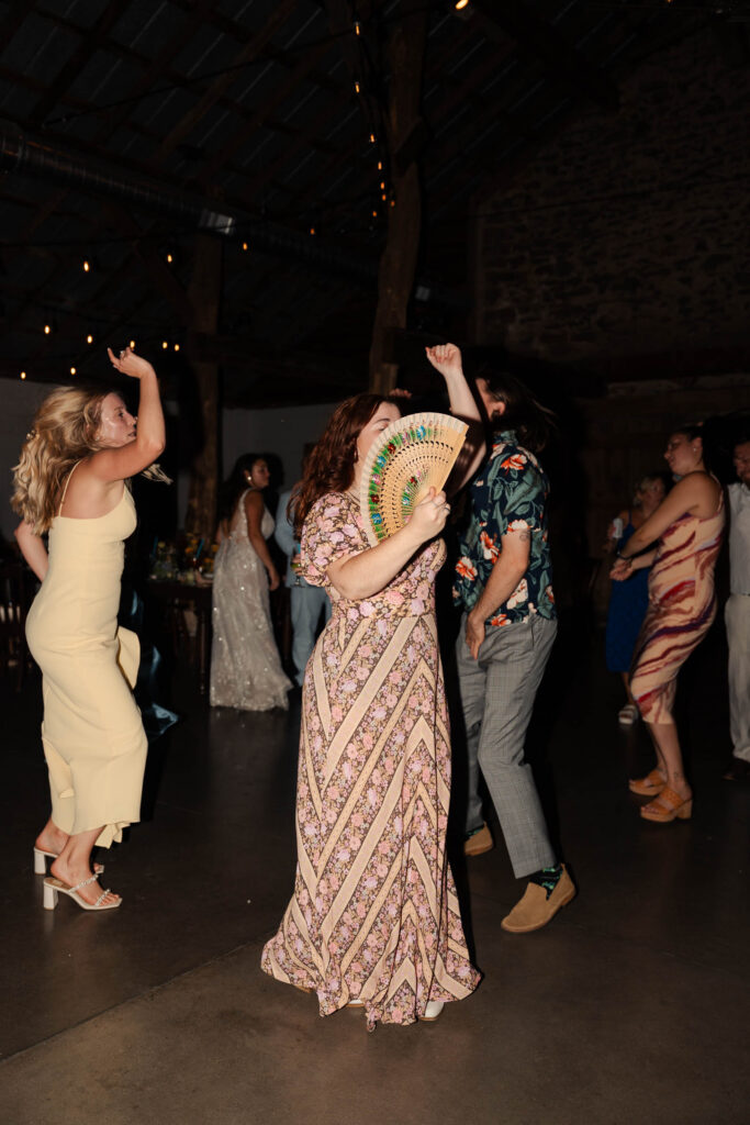 Fun summer wedding at a New Jersey wedding venue with vibrant florals and creative decor.