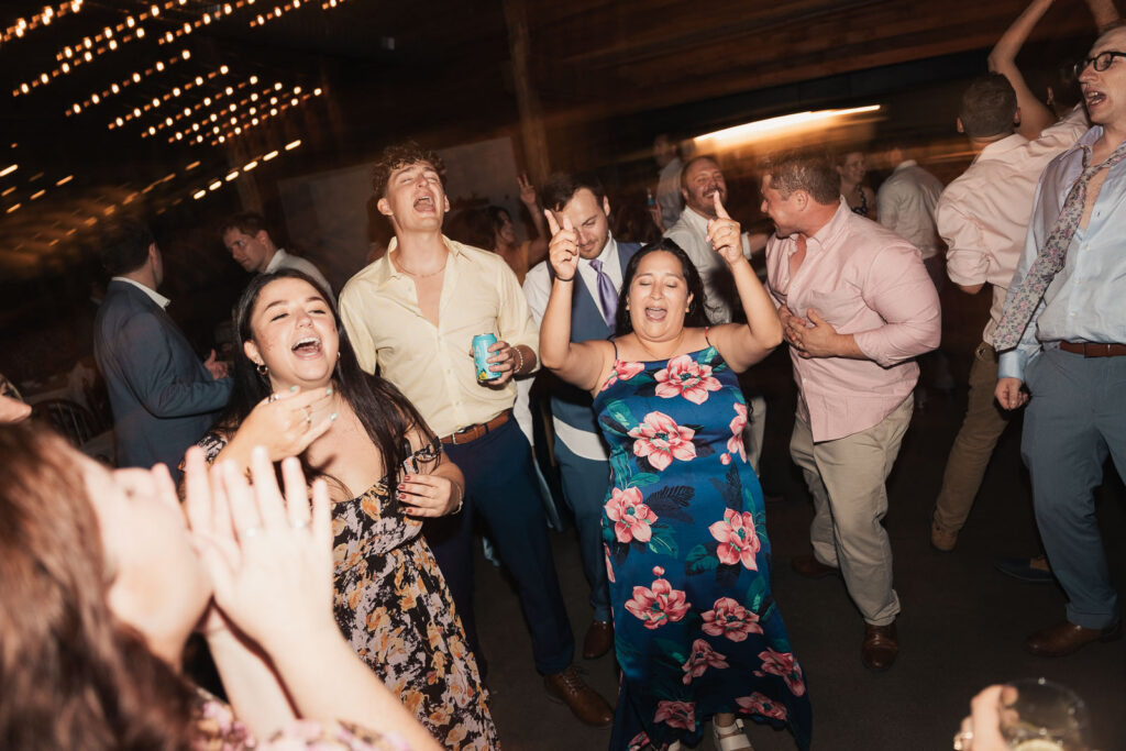 Fun summer wedding at a New Jersey wedding venue with vibrant florals and creative decor.