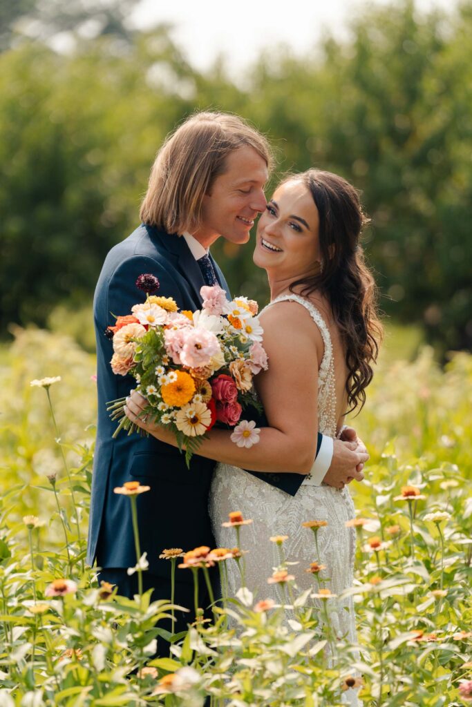 Fun summer wedding at a New Jersey wedding venue with vibrant florals and creative decor.