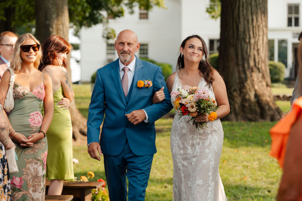 Fun summer wedding at a New Jersey wedding venue with vibrant florals and creative decor.