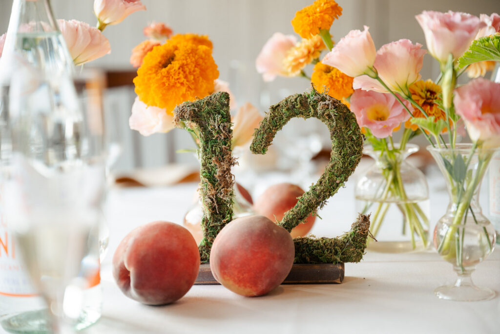 Fun summer wedding at a New Jersey wedding venue with vibrant florals and creative decor.