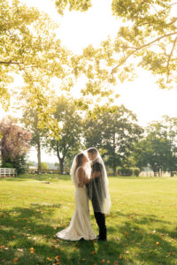 A bride and groom on a summer wedding day.