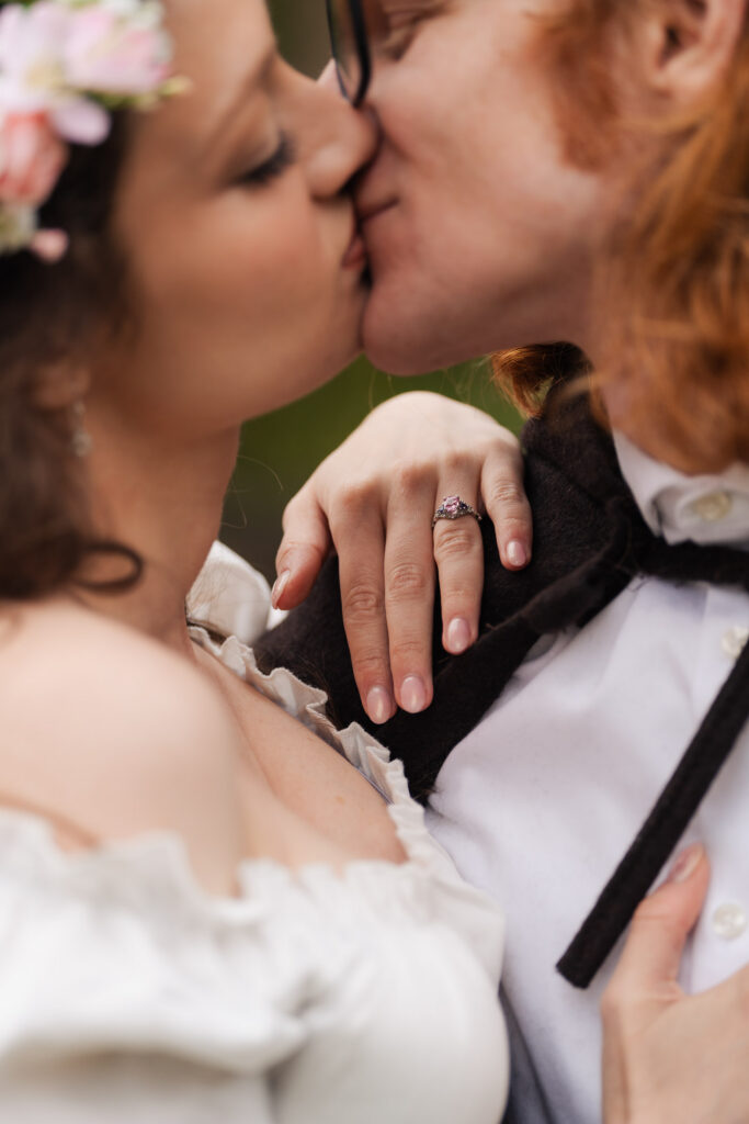 A Renaissance-inspired autumn engagement session at Skylands Manor and the New Jersey Botanical Gardens in Ringwood, NJ, featuring flower crowns, a wool cape, and romantic garden portraits before a Stone House wedding.