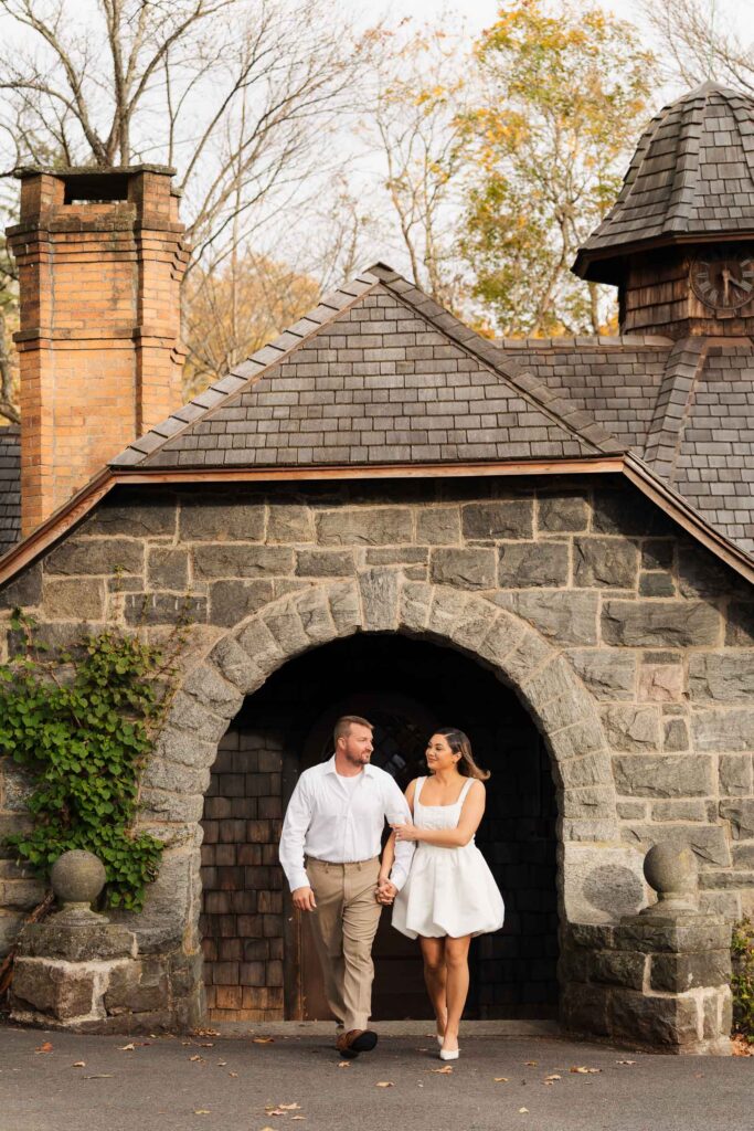 A vintage-inspired late autumn engagement session at Skylands Manor and the New Jersey Botanical Gardens in Ringwood, NJ, featuring fall foliage, classic outfits, and romantic garden portraits.