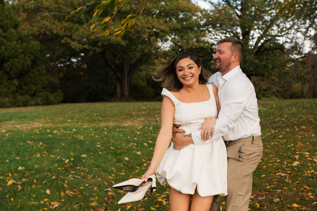 A vintage-inspired late autumn engagement session at Skylands Manor and the New Jersey Botanical Gardens in Ringwood, NJ, featuring fall foliage, classic outfits, and romantic garden portraits.