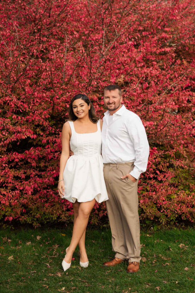 A vintage-inspired late autumn engagement session at Skylands Manor and the New Jersey Botanical Gardens in Ringwood, NJ, featuring fall foliage, classic outfits, and romantic garden portraits.