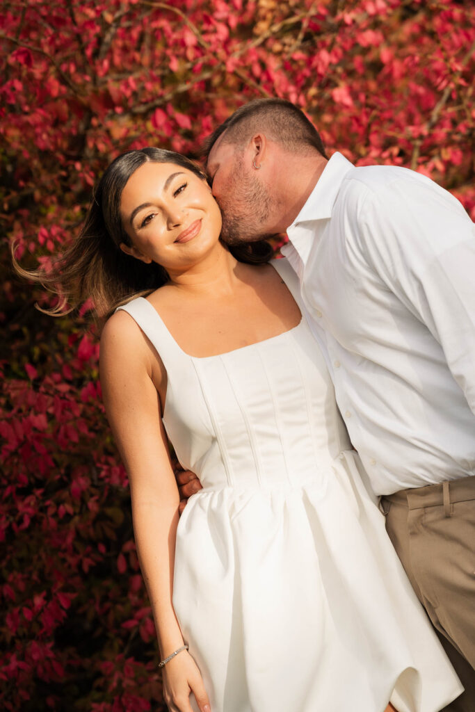 A vintage-inspired late autumn engagement session at Skylands Manor and the New Jersey Botanical Gardens in Ringwood, NJ, featuring fall foliage, classic outfits, and romantic garden portraits.