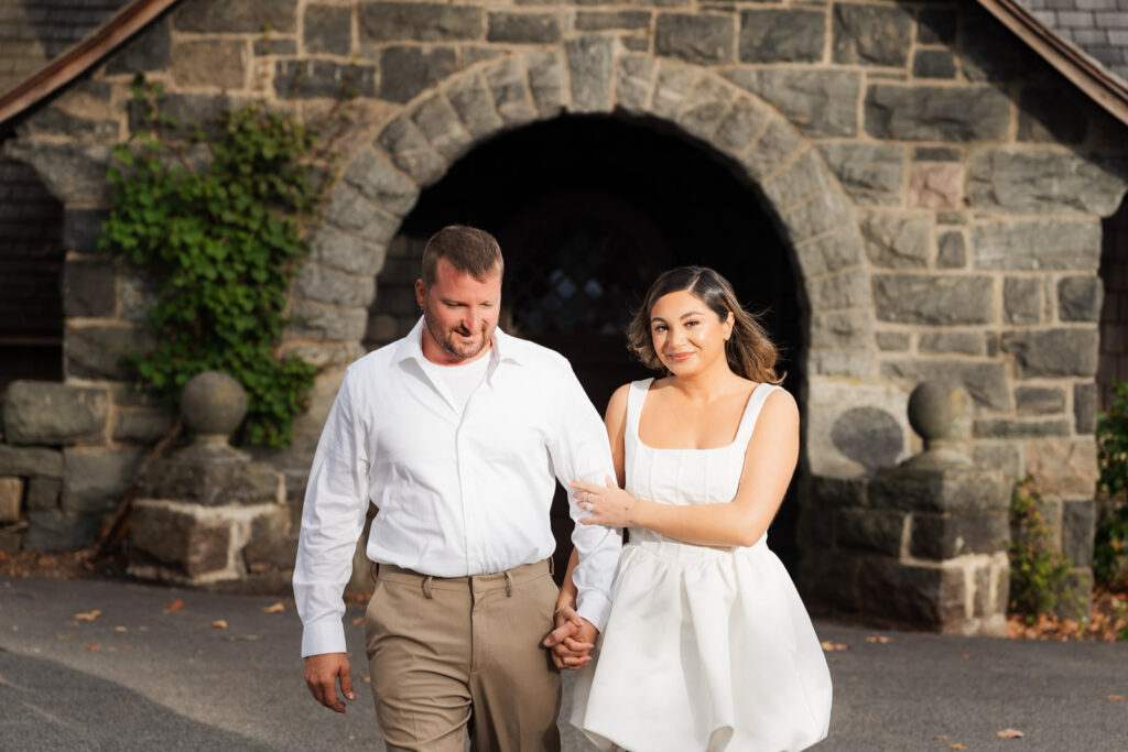 A vintage-inspired late autumn engagement session at Skylands Manor and the New Jersey Botanical Gardens in Ringwood, NJ, featuring fall foliage, classic outfits, and romantic garden portraits.