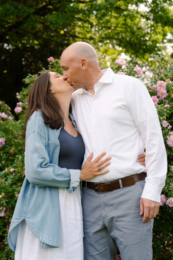 A family photoshoot in a rose garden on a sunny spring afternoon in Bloomfield New Jersey.