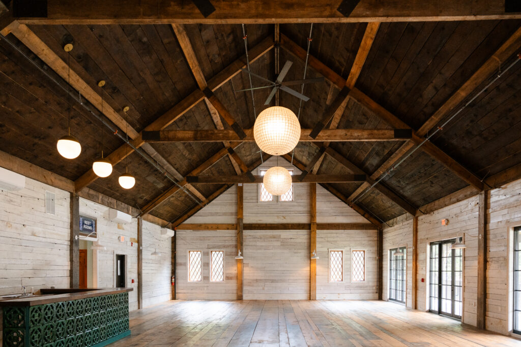 Pine Brook Manor wedding venue in New York surrounded by forests and natural landscapes.